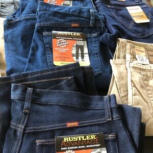 Lot of men’s jeans and pants. All new with tags. Mens Wrangler. Mens Rustler.